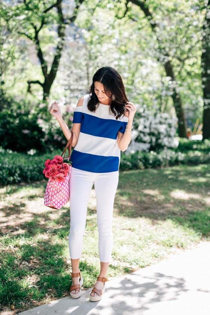 Amanda Miller wearing a cold shoulder nautical striped tee from Goodnight Macaroon