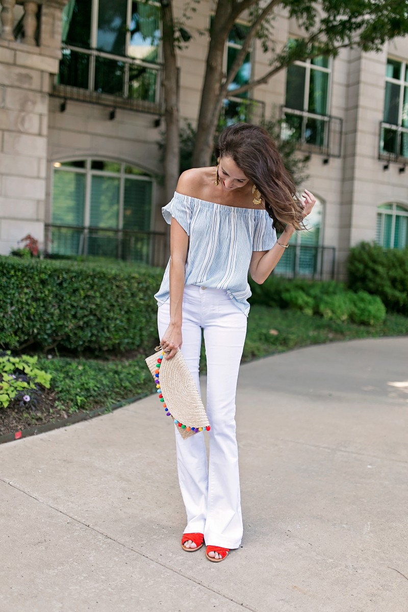 The Miller Affect wearing white jeans for tall women and a striped off the shoulder top