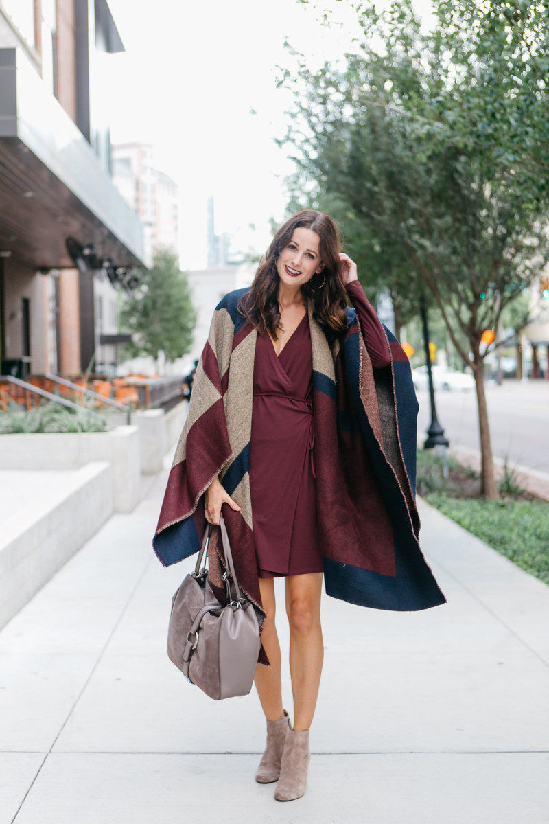 The Miller Affect in a burgundy wrap dress and a colorblock poncho from Nordstrom