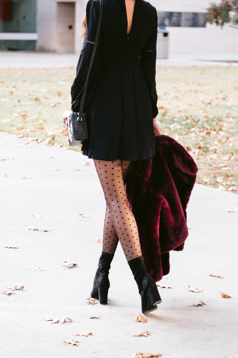 The Miller Affect wearing polka dot tights and tall black booties