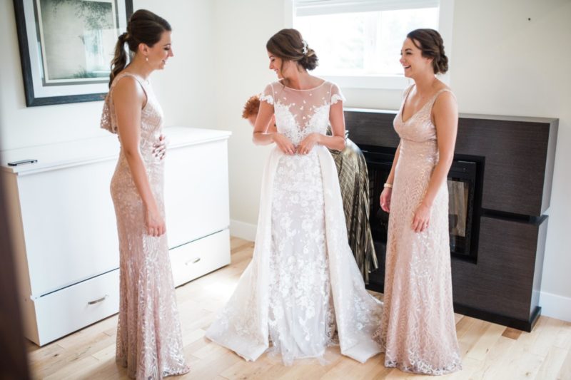 The Miller Affect sisters wearing gold sequin bridesmaid dresses from Watters