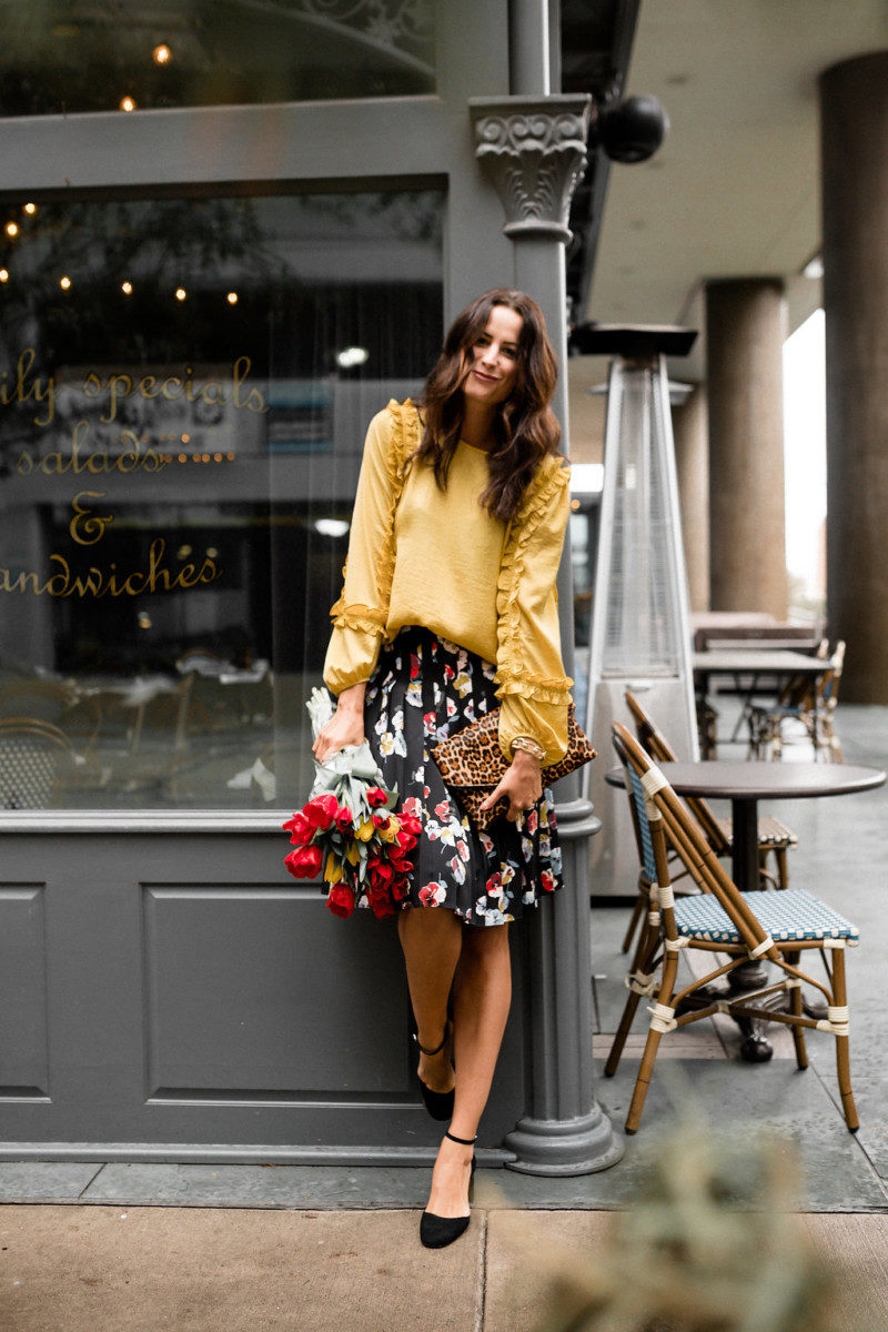 the miller affect wearing a floral pleated skirt from ann taylor
