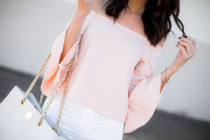 The Miller Affect wearing a blush bell sleeved blouse from asos