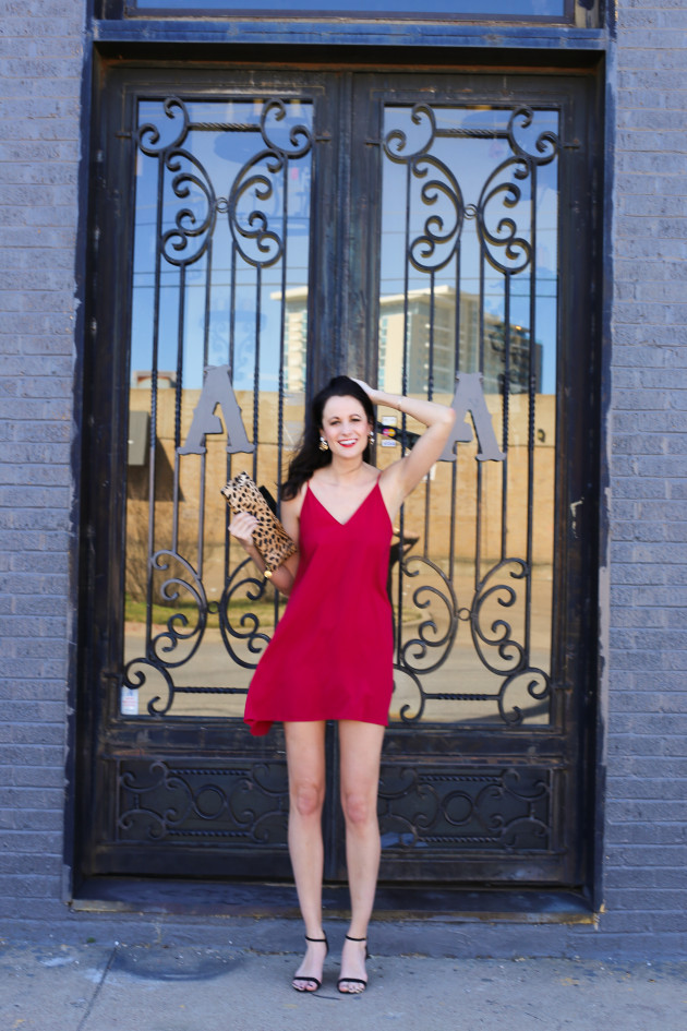 Amanda Miller wearing a red valentines day camisole shift dress