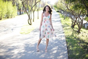 Amanda Miller wearing a mult fit and flare floral dress from BB Dakota