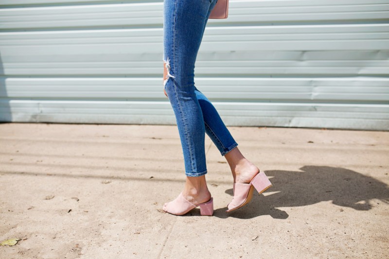 The Miller Affect wearing pink suede mules from Front Row