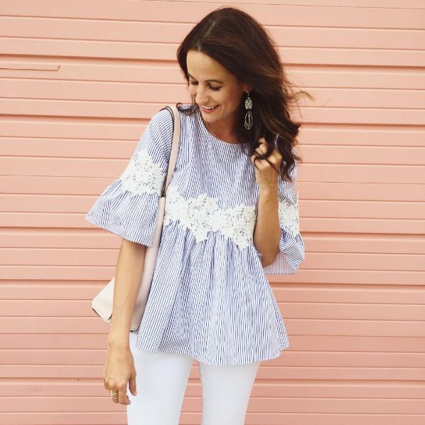 Amanda Miller wearing a Chicwish bell-sleeved blouse under $60