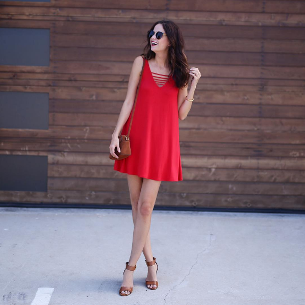 Amanda Miller wearing a red jersey shift dress that is less than $50