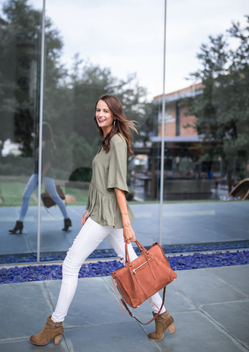 The Miller Affect wearing white distressed jeans and khaki suede booties