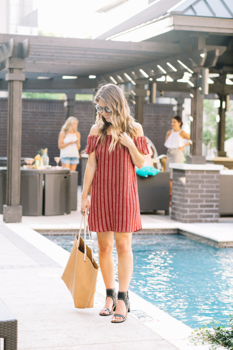 The Fashion Hour wearing a Bobeau Off the Shoulder dress and black studded sandals