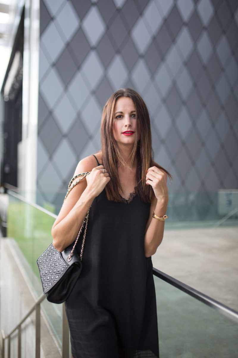 Amanda Miller wearing a black tory burch handbag and a black slip dress  from Nordstrom - The Miller Affect