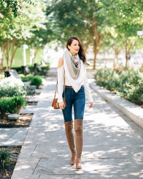 The Miller Affect wearing a chevron print scarf and a cold shoulder ivory top