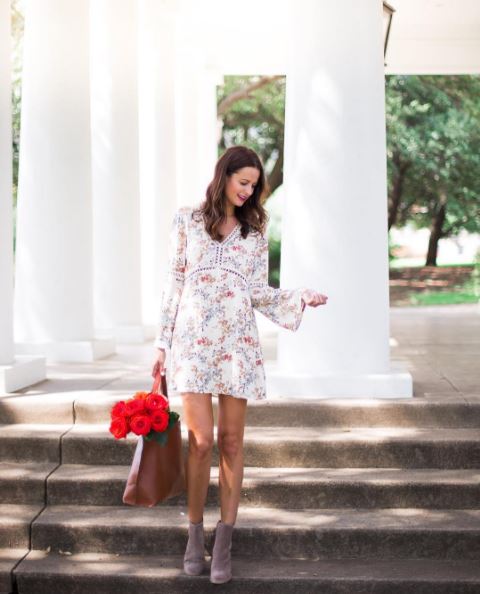 The Miller Affect in a white floral WAYF bell sleeved dress and Marc Fisher suede booties