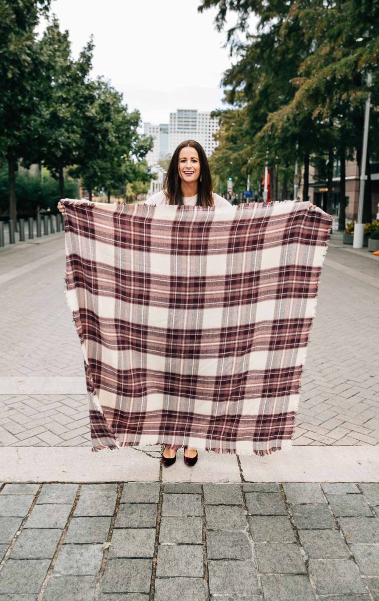 Amanda Miller showing you how to tie a blanket scarf