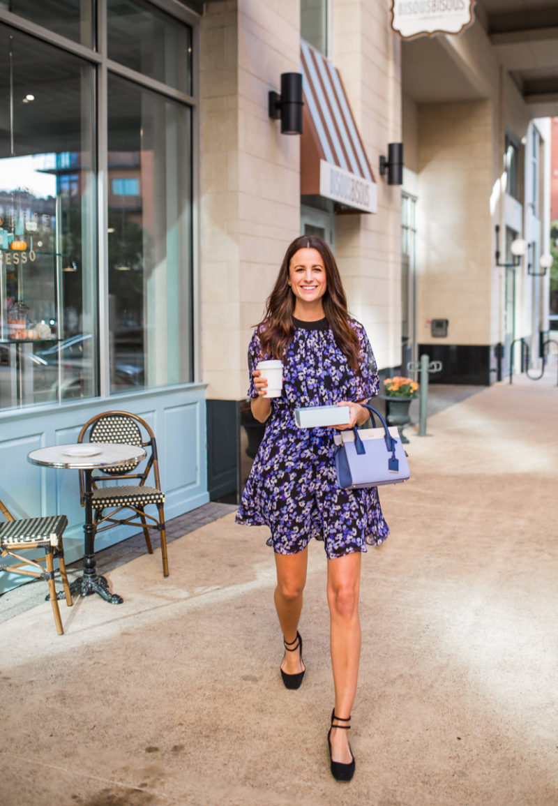 The Miller Affect wearing a Kate Spade dress, heels, and tote