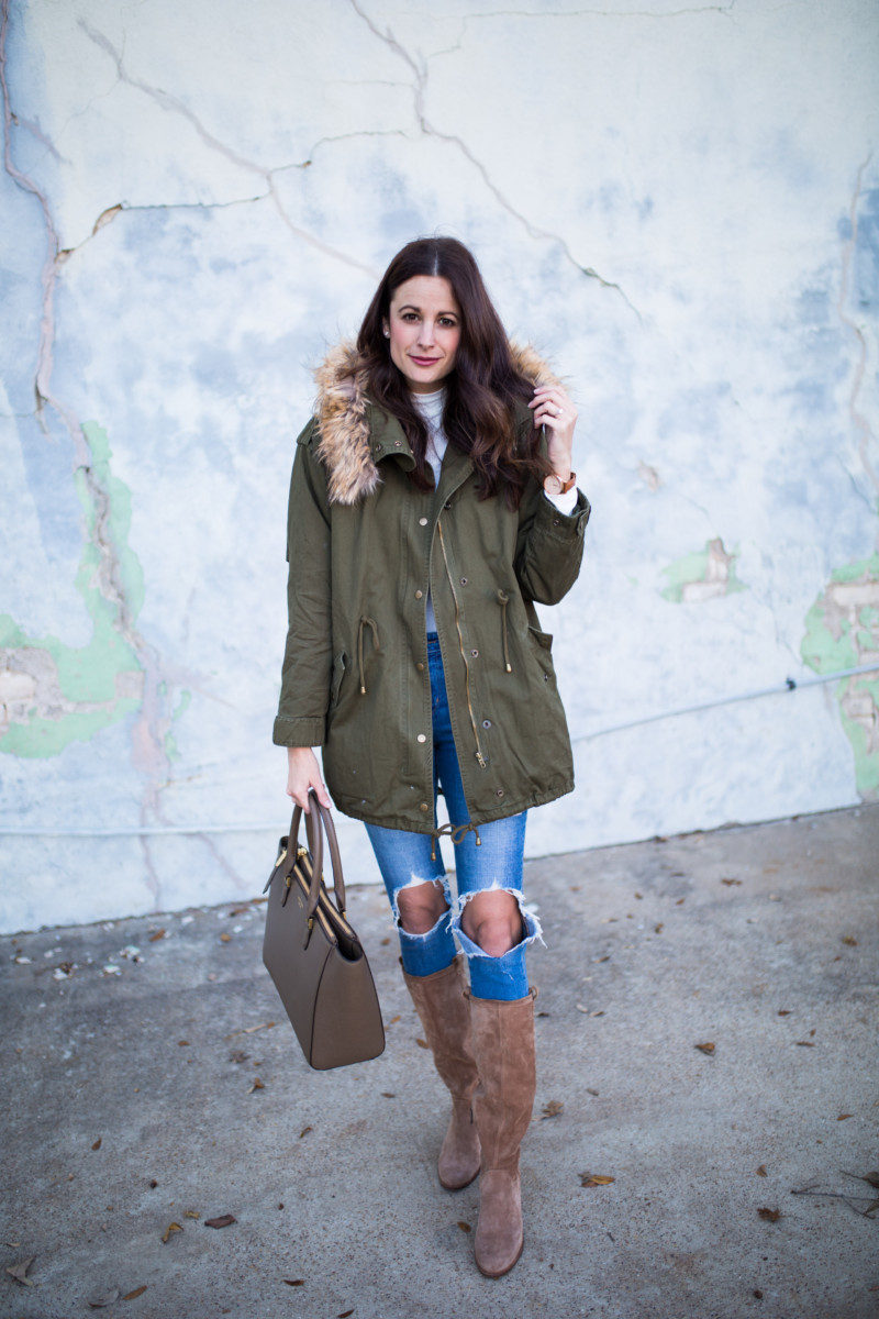 The Miller Affect wearing a green parka for her 7 Coats 7 Days series