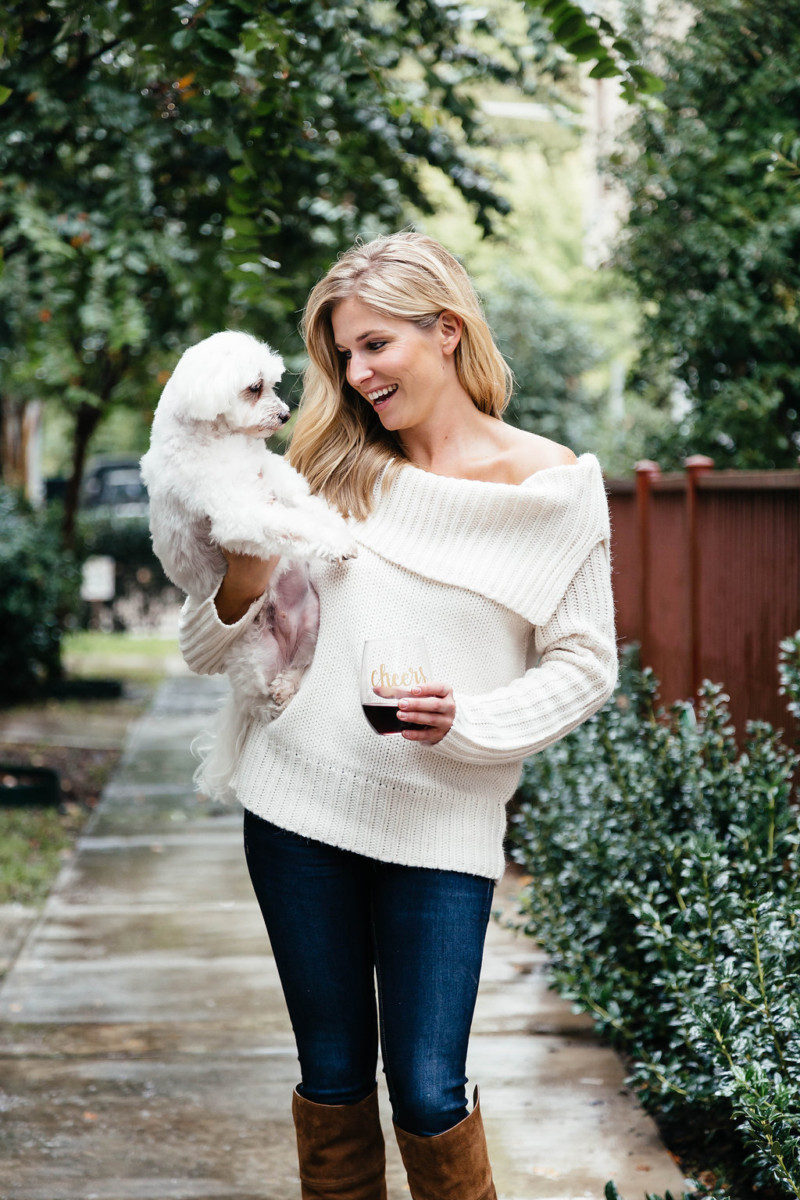 One Small Blonde and pup in an off the shoulder sweater and suede over the knee boots for thanksgiving