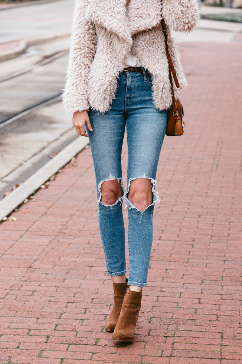 Amanda Miller wearing Levis jeans and brown Steve Madden Booties