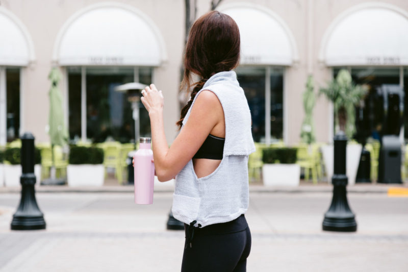 The Miller Affect wearing a grey workout top from Free People and black lululemon leggings