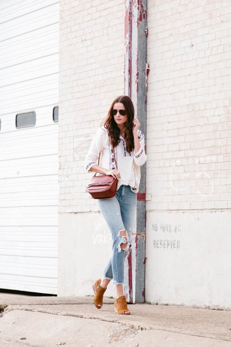 The Miller Affect wearing light wash distressed jeans from Lucky Brand