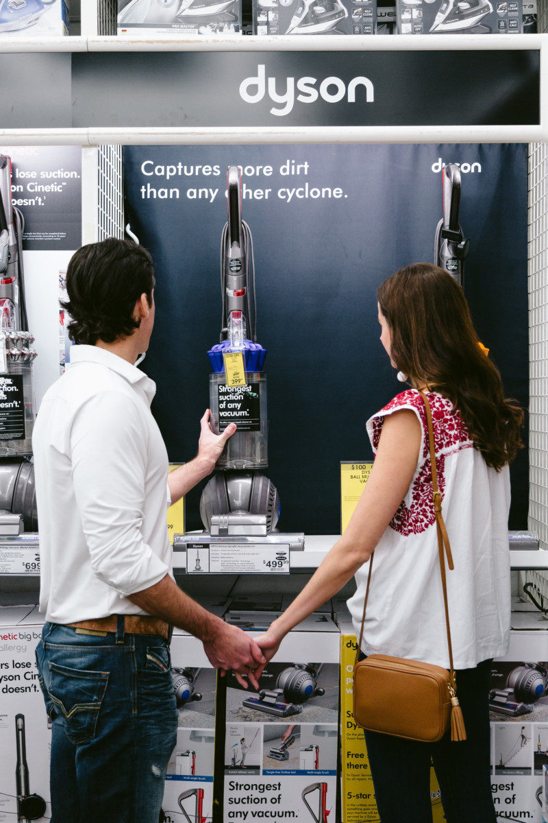 The Miller Affect and finance picking out their Dyson vacuum for their wedding registry at Bed Bath and Beyond