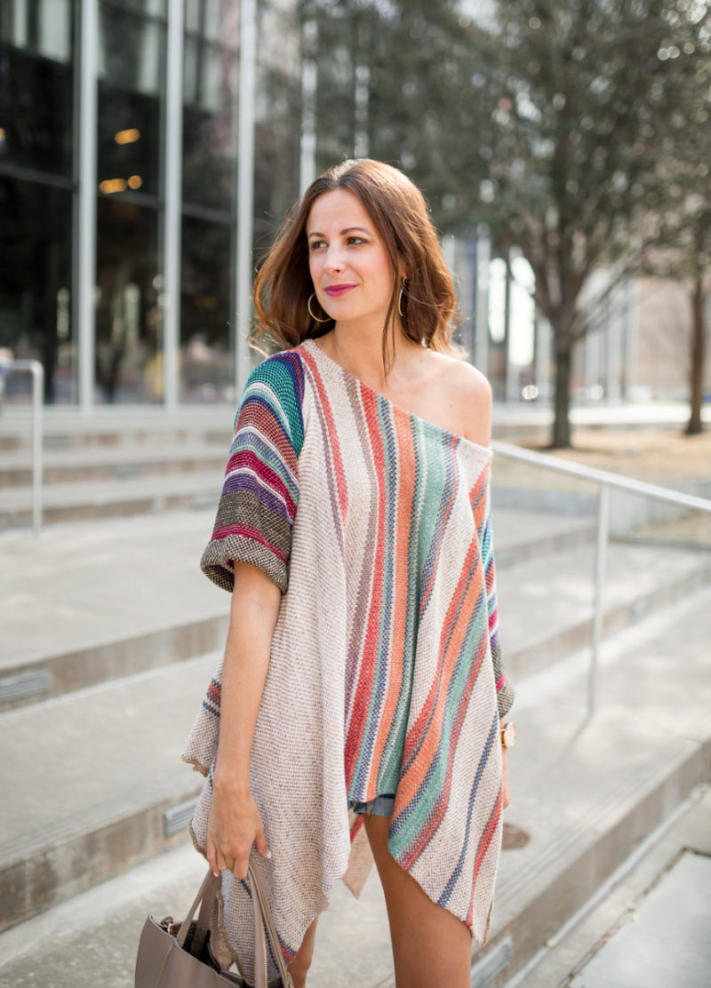 Amanda Miller wearing the Fressia Stripe Poncho Sweater from Free People