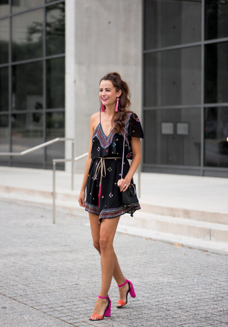 The Miller Affect wearing a colorful free people festival dress