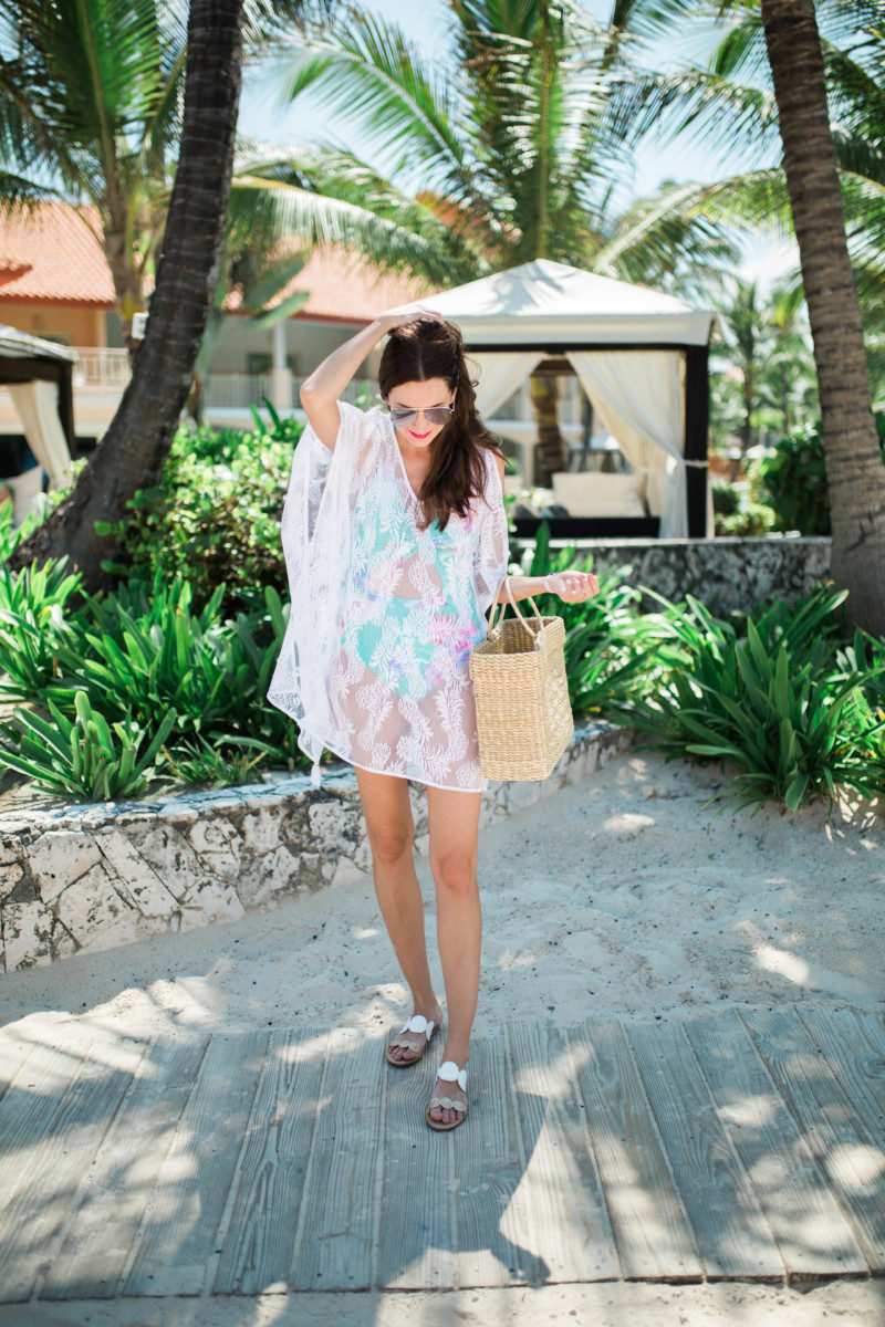 The Miller Affect wearing a white pineapple caftan from Lilly pullitzer