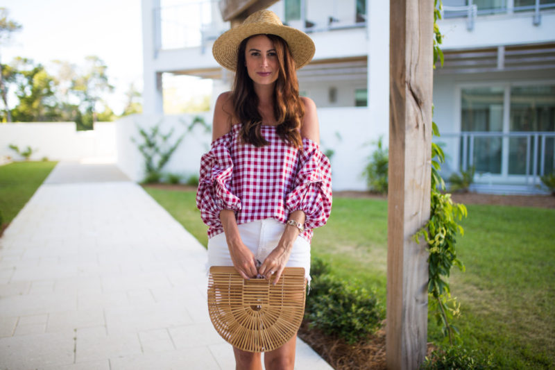 The Miller Affect wearing a red gingham off the shoulder top from MLM
