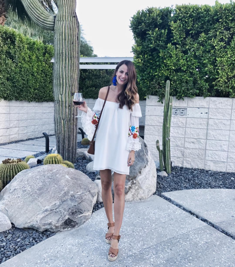The Miller Affect wearing a white Vava by joy han dress in palm Springs