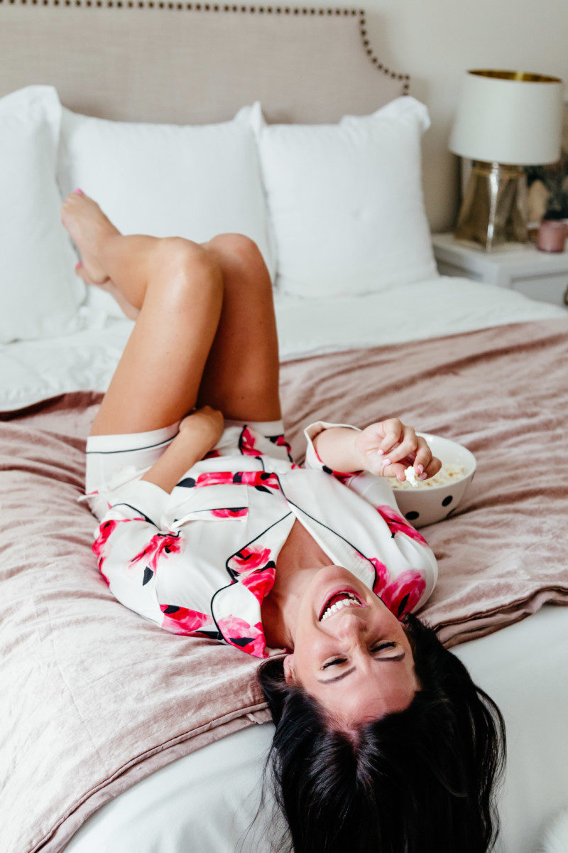 lynlee poston wearing a roses pajama set from kate spade new york