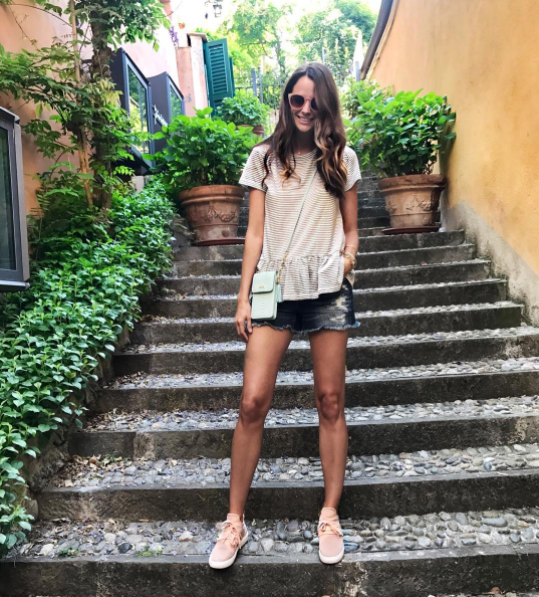The Miller Affect wearing a stripe peplum tee in Bellagio, Italy