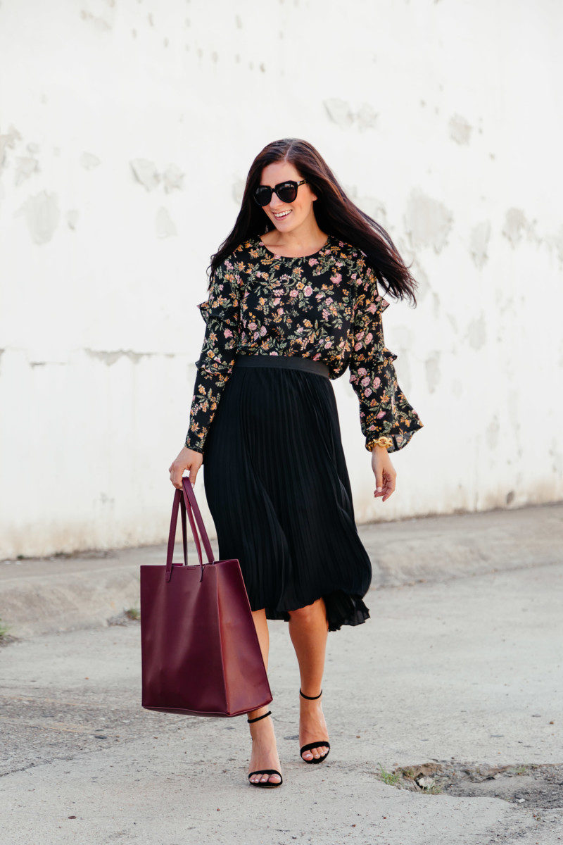 Gal About Town wearing a floral ruffled top from the #nsale