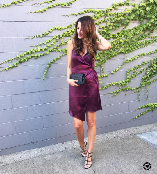 the miller affect wearing a purple satin wrap dress from the nordstrom anniversary sale