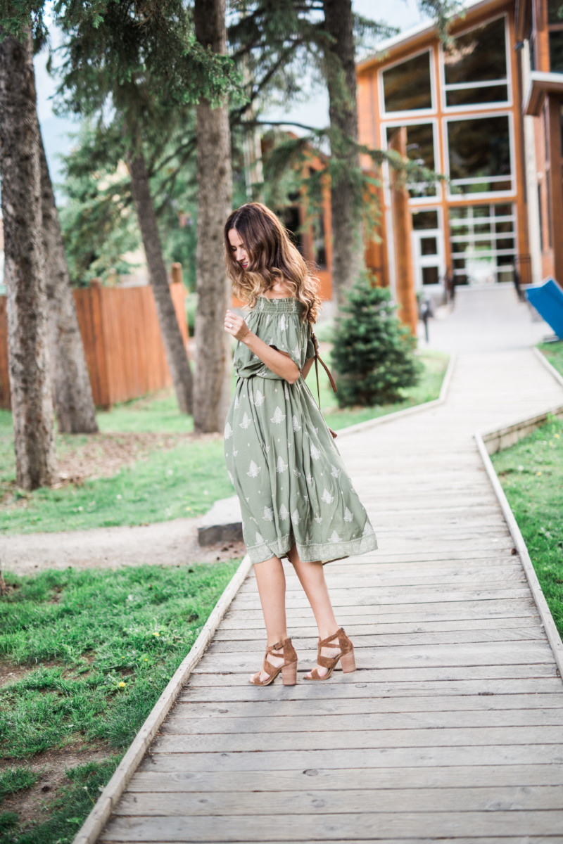 The Miller Affect wearing a green dress in canmore canada