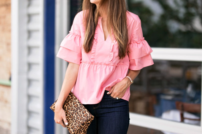 The Miller Affect wearing a pink ruffle top from Ann Taylor