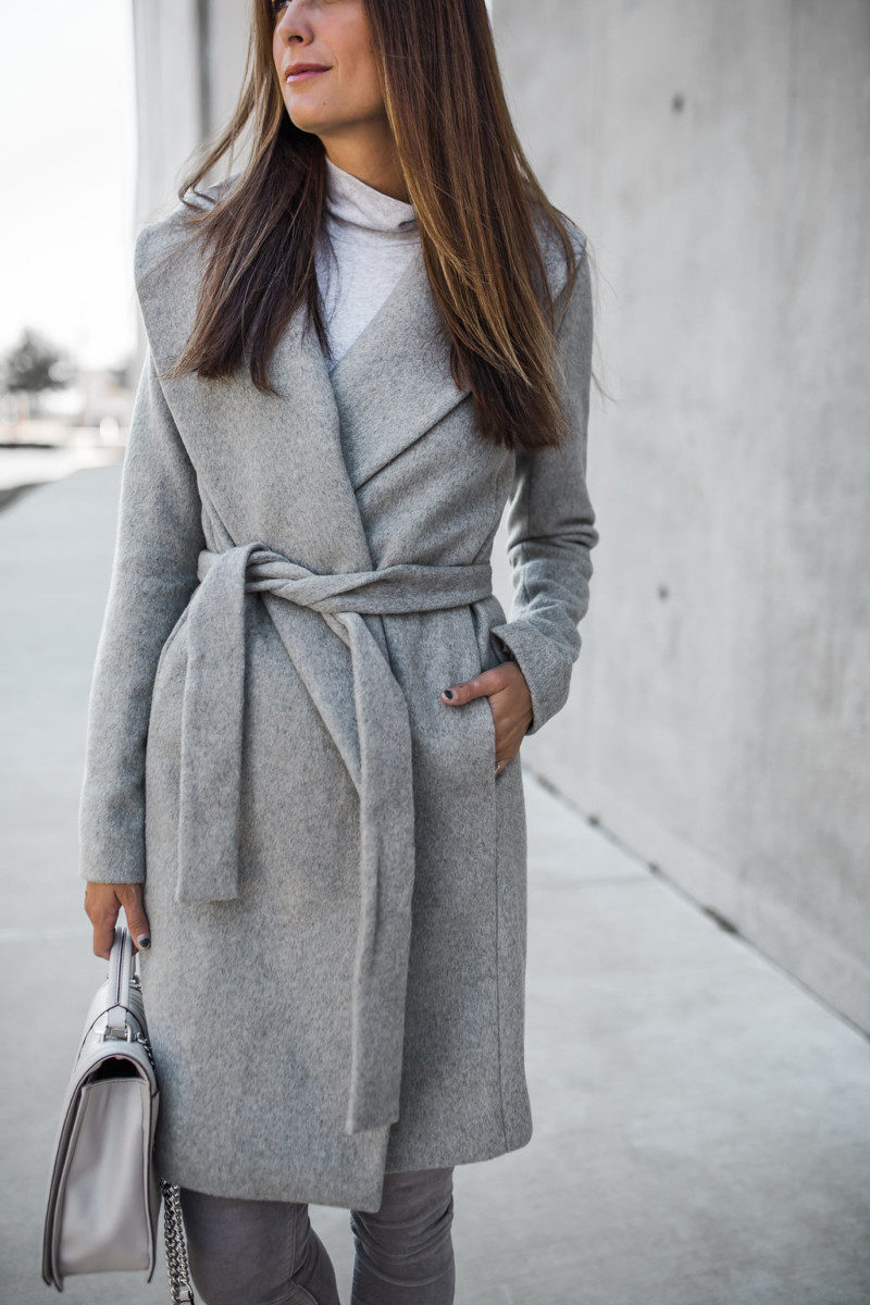the miller affect wearing a grey coat from ann taylor