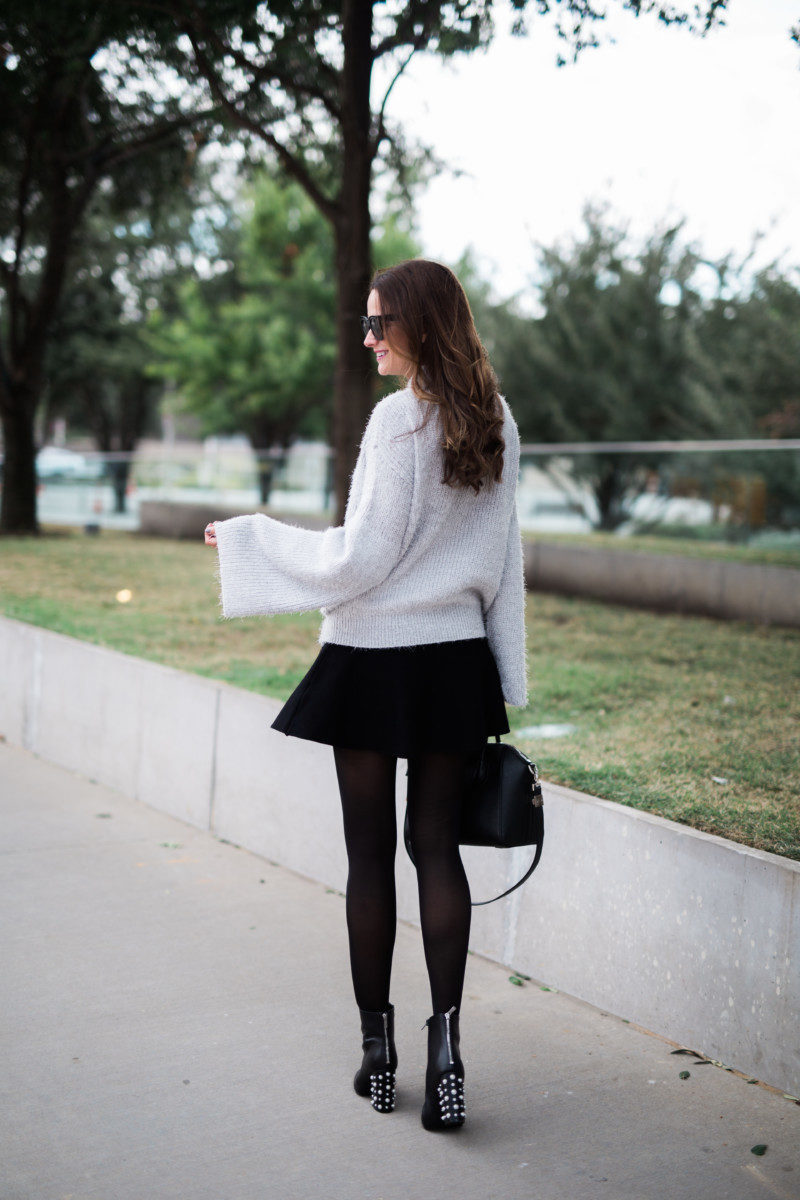 the miller affect wearing black tights with black booties
