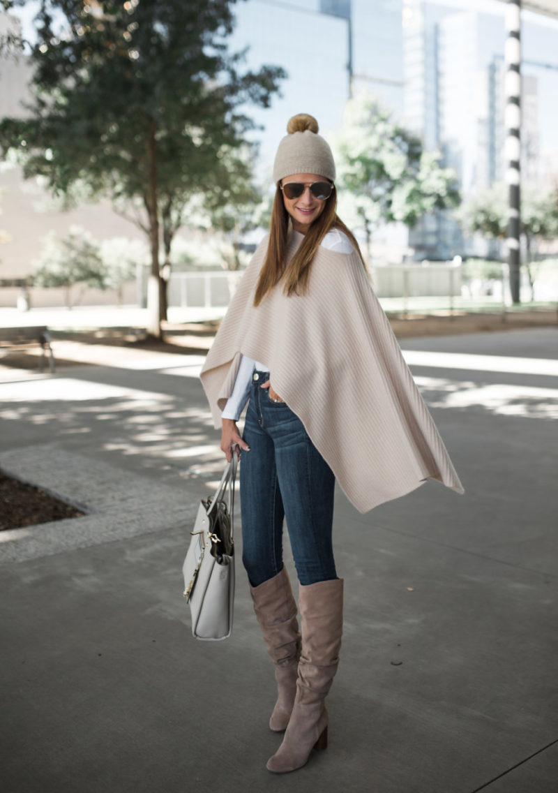 The Miller Affect wearing a faux fur beanie and a cashmere T Cape from Henri Bendel