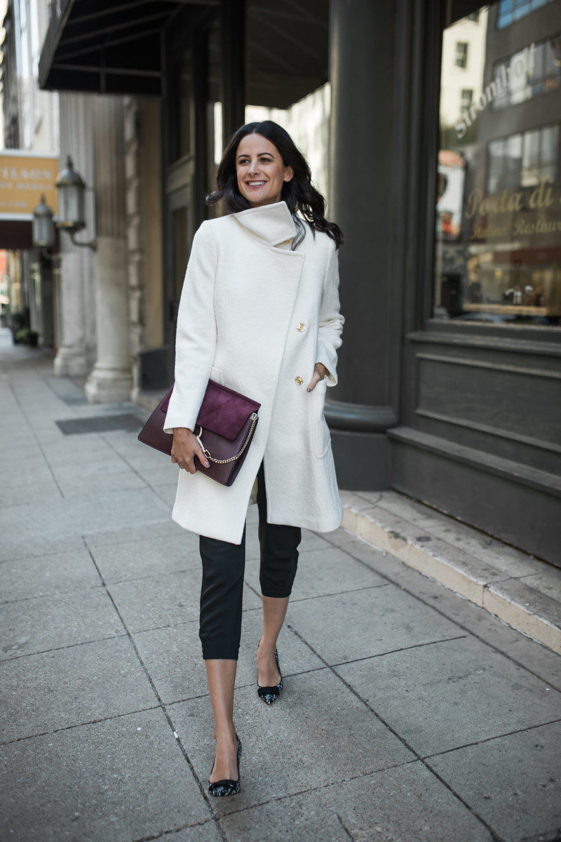 The Miller Affect wearing a white boucle coat from Ann Taylor