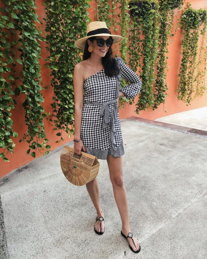 The Miller Affect wearing a one shoulder gingham dress from ella moon
