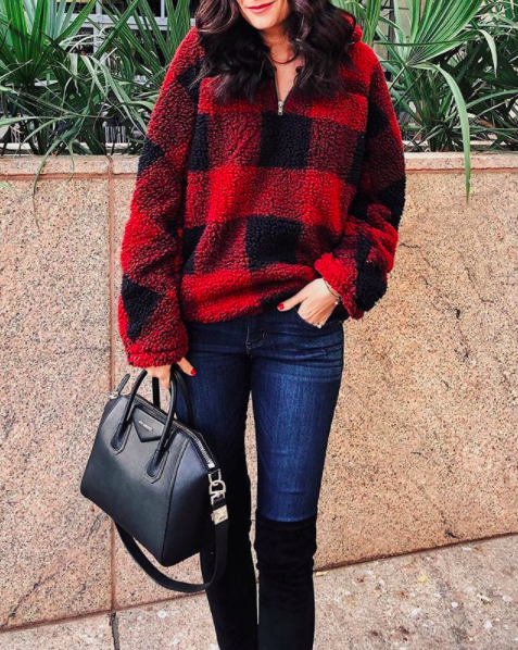 the miller affect wearing a buffalo plaid sherpa pullover