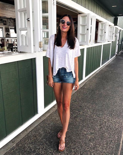 the miller affect wearing a white free people tee in Lahaina Maui