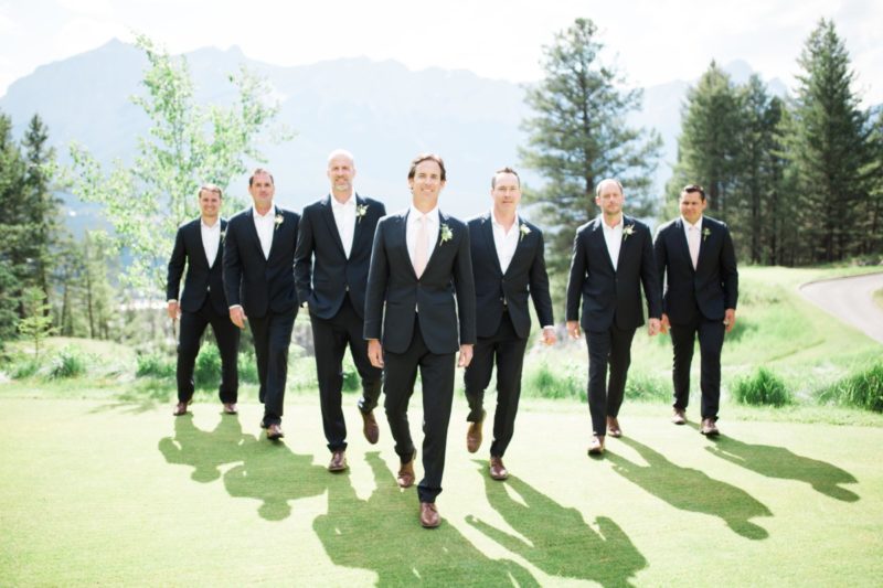 The Miller Affect wedding, groomsmen wearing navy suits with pink ties