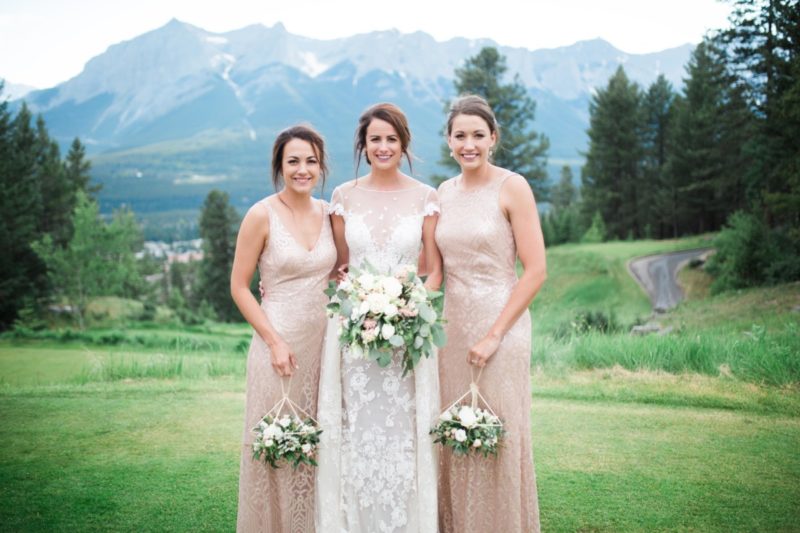 The Miller Affect bridesmaids wearing rose gold sequin dresses from Watters