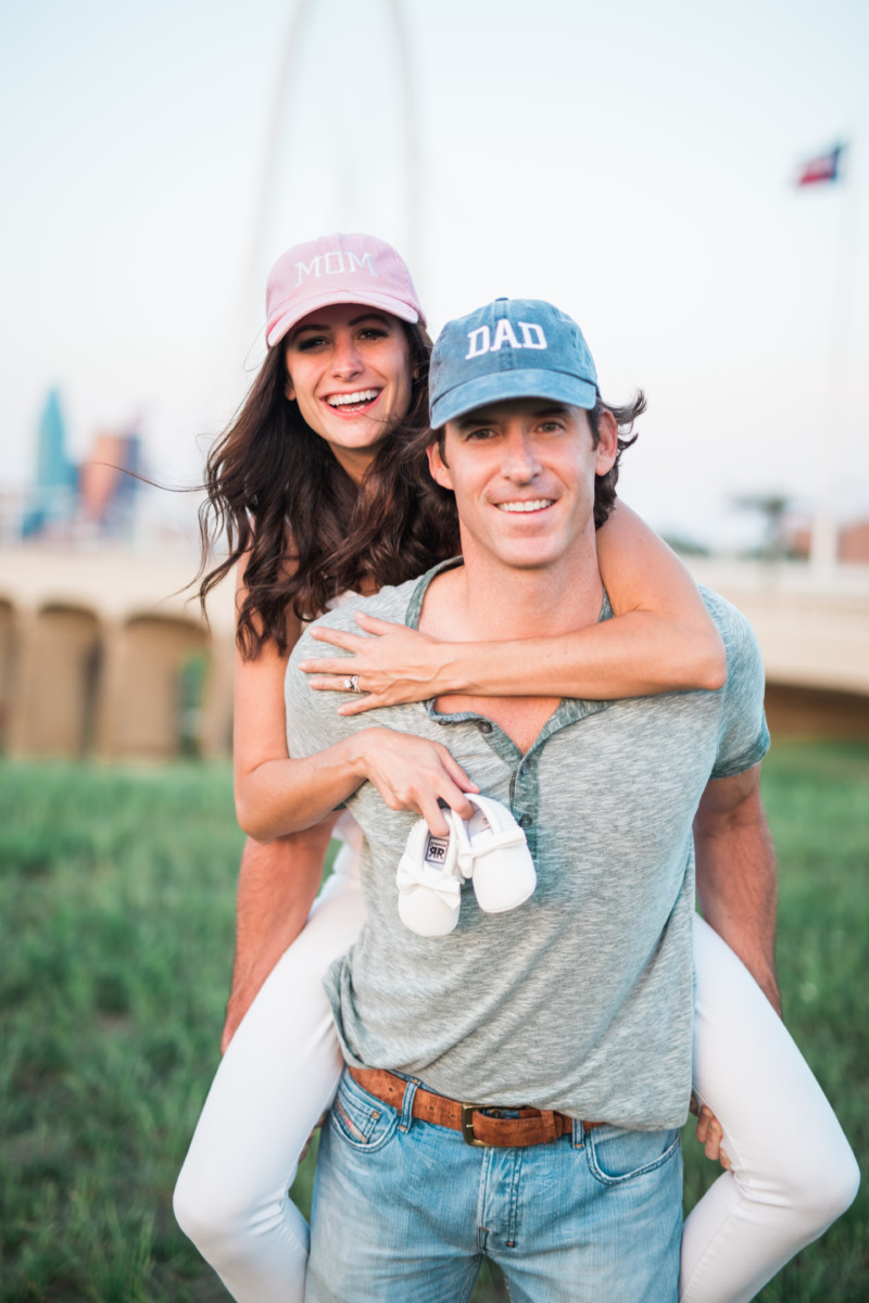 the miller affect and husband wearing mom and dad hats for pregnancy announcement