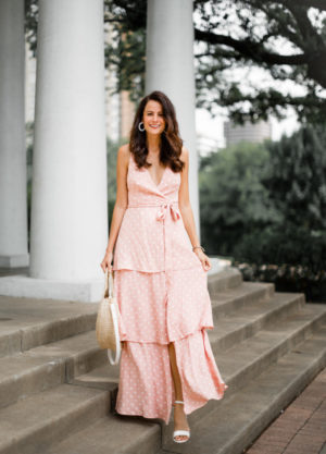 the miller affect wearing a pink tiered maxi dress from Nordstrom