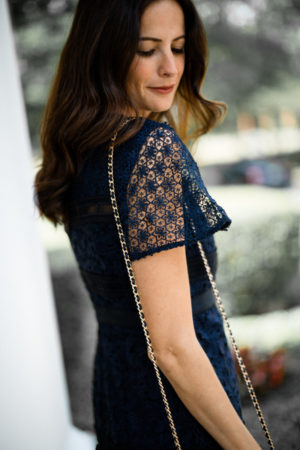 the miller affect wearing a mixed lace flare dress from Ann Taylor
