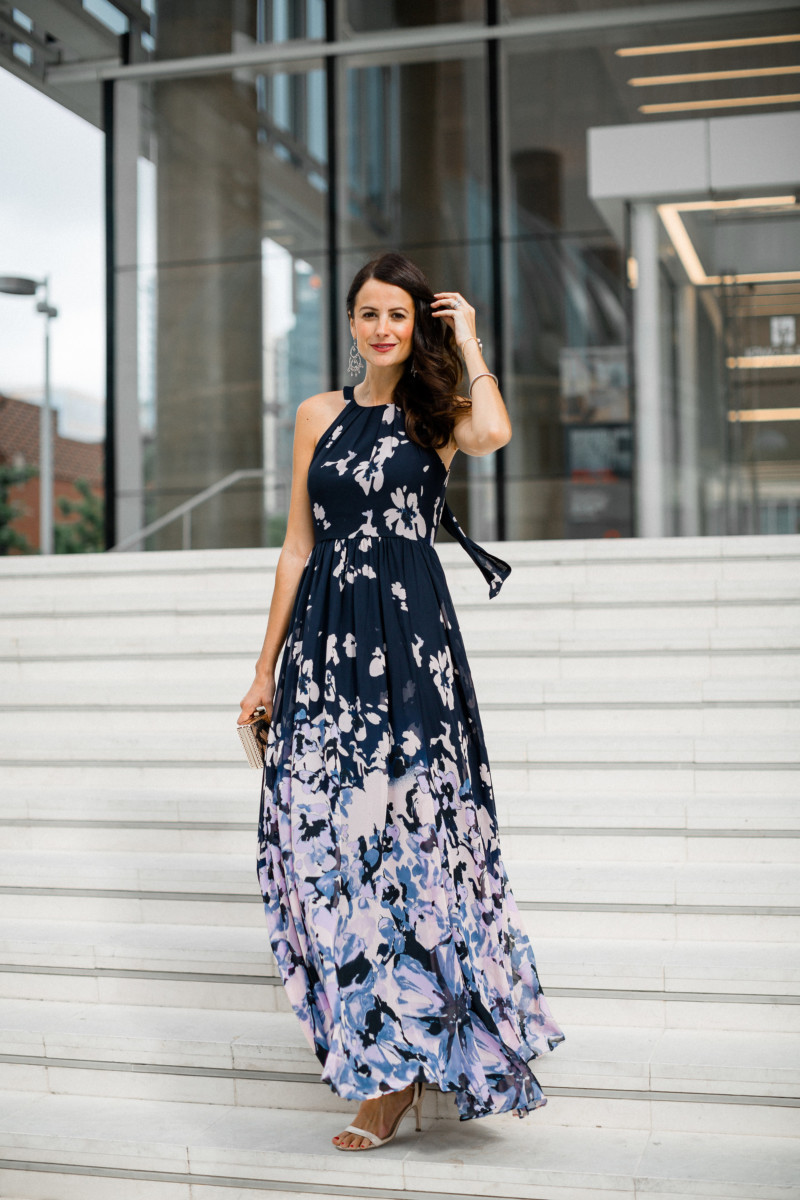 the miller affect wearing a gorgeous floral maxi dress to s summer wedding