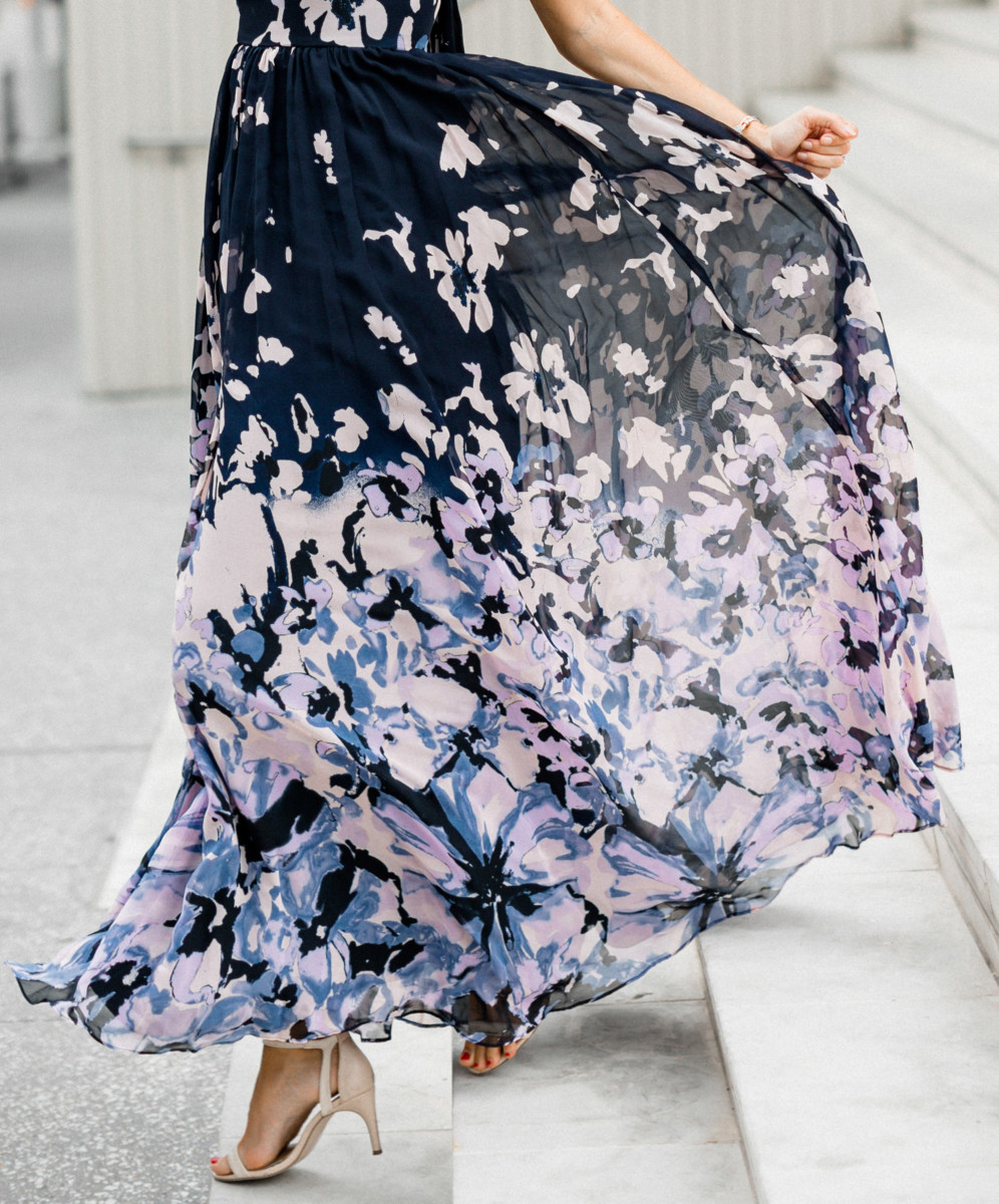 the miller affect wearing a navy chiffon maxi dress from david's bridal